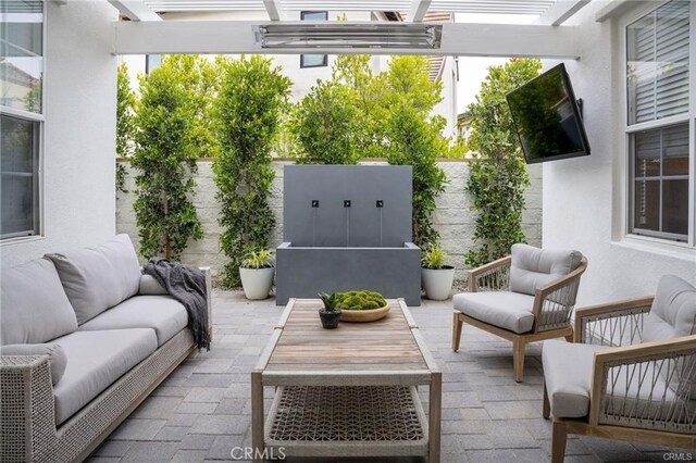 32 Bargemon, Newport Coast, CA 92657 - fenced backyard featuring outdoor lounge area, a pergola, and a patio area