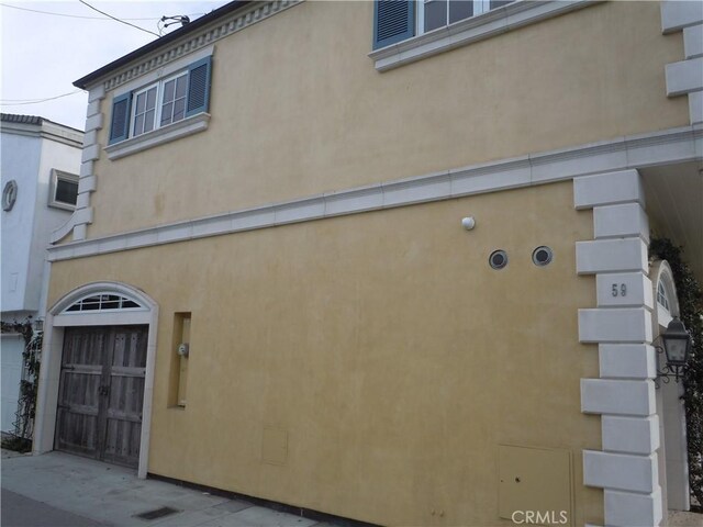 59 Rivo Alto Canal, Long Beach, CA 90803 - view of side of property with stucco siding