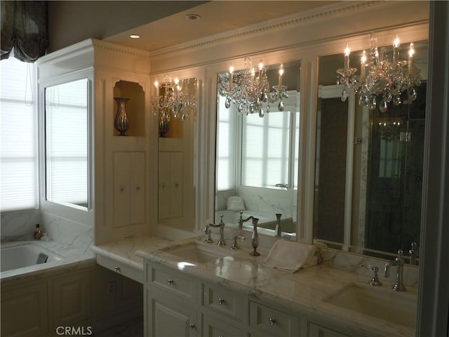 59 Rivo Alto Canal, Long Beach, CA 90803 - bathroom with a chandelier, a garden tub, and double vanity