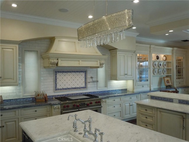59 Rivo Alto Canal, Long Beach, CA 90803 - kitchen with high end stove, ornamental molding, backsplash, light stone countertops, and recessed lighting