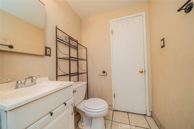 17941 E Payson St, Azusa, CA 91702 - bathroom featuring toilet, tile patterned floors, vanity, and baseboards