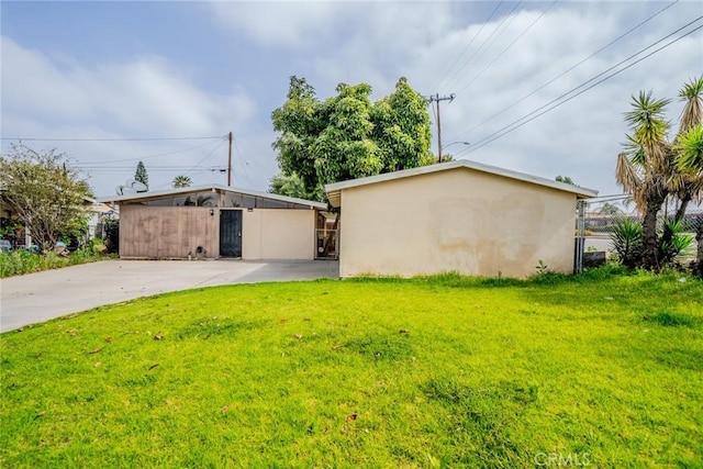 17941 E Payson St, Azusa, CA 91702 - view of side of home featuring stucco siding and driveway