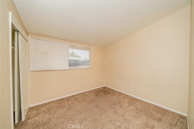 17941 E Payson St, Azusa, CA 91702 - unfurnished bedroom with carpet flooring, baseboards, and a closet