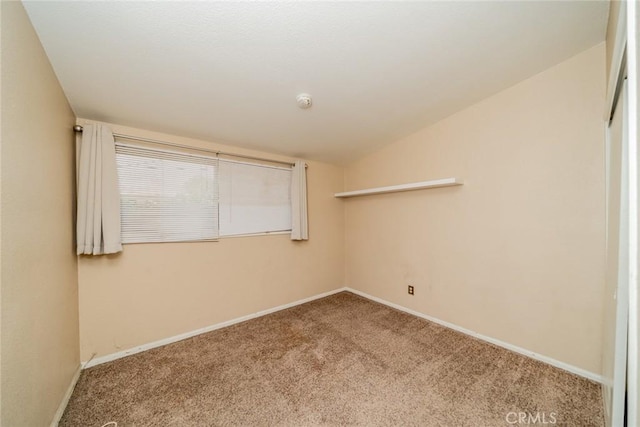 17941 E Payson St, Azusa, CA 91702 - empty room featuring carpet, baseboards, and vaulted ceiling