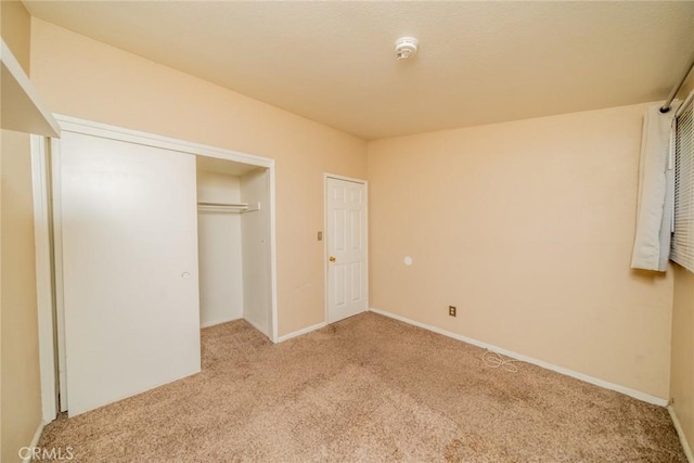 17941 E Payson St, Azusa, CA 91702 - unfurnished bedroom with carpet floors, a closet, and baseboards