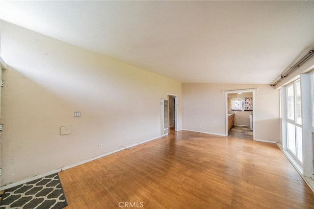 17941 E Payson St, Azusa, CA 91702 - empty room with light wood-type flooring and baseboards