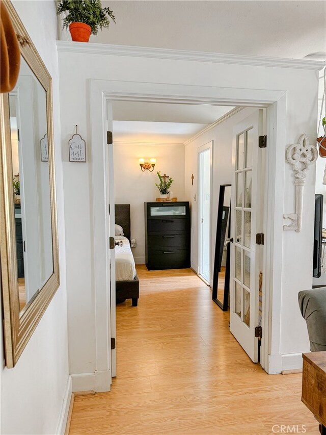 315 W 3rd St Unit 203, Long Beach, CA 90802 - hallway featuring light wood-style flooring, baseboards, and crown molding