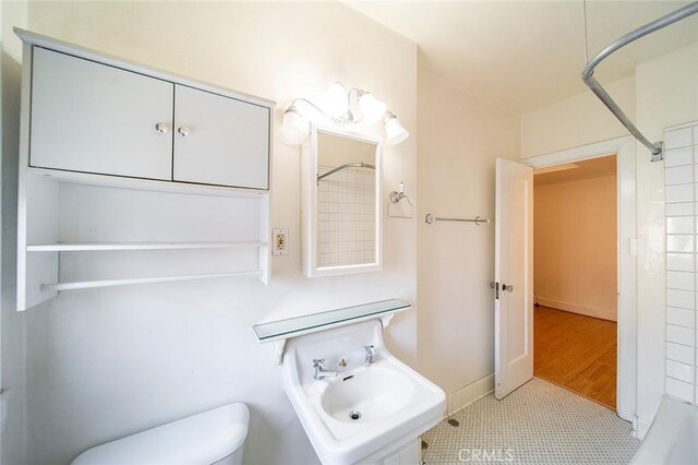 315 W 3rd St Unit 203, Long Beach, CA 90802 - full bath with a shower, toilet, and tile patterned flooring