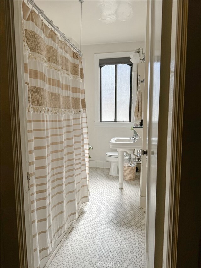 315 W 3rd St Unit 203, Long Beach, CA 90802 - full bath featuring toilet and a shower with shower curtain