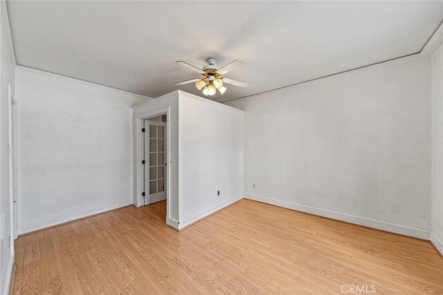 315 W 3rd St Unit 203, Long Beach, CA 90802 - unfurnished room featuring ceiling fan, light wood-style floors, and baseboards