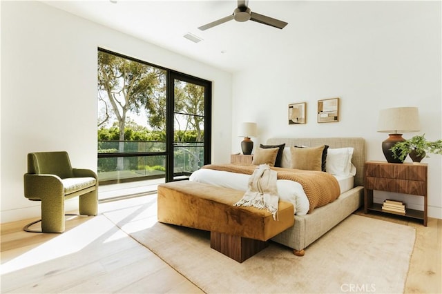2321 Mesa Dr, Newport Beach, CA 92660 - bedroom with access to outside, wood finished floors, and ceiling fan