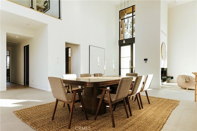 2321 Mesa Dr, Newport Beach, CA 92660 - dining room with a high ceiling and baseboards