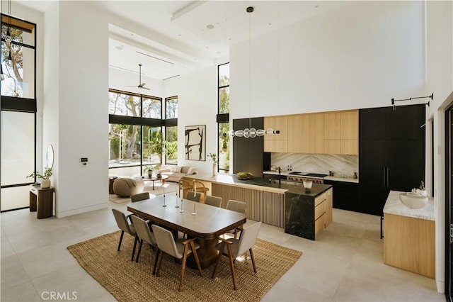 2321 Mesa Dr, Newport Beach, CA 92660 - dining room with a high ceiling and ceiling fan