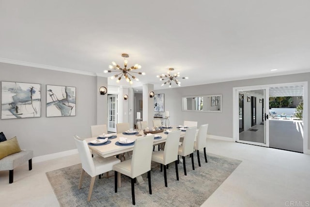 5918 Germaine Ln, La Jolla, CA 92037 - dining area featuring a chandelier, ornamental molding, baseboards, healthy amount of natural light, and carpet floors