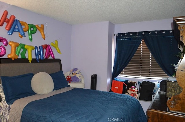 13321 Meyer Rd Unit B, Whittier, CA 90605 - bedroom featuring a textured ceiling