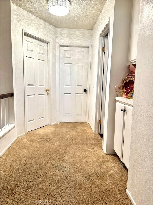 13321 Meyer Rd Unit B, Whittier, CA 90605 - hall with carpet flooring and a textured ceiling