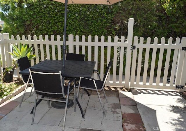 13321 Meyer Rd Unit B, Whittier, CA 90605 - view of patio / terrace featuring outdoor dining area