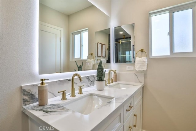 13181 Olympia Way N, Tustin, CA 92705 - bathroom featuring double vanity and a shower
