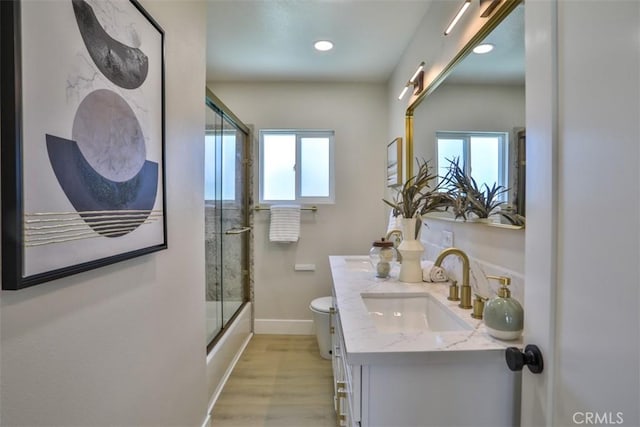13181 Olympia Way N, Tustin, CA 92705 - full bathroom with plenty of natural light, vanity, toilet, baseboards, and recessed lighting