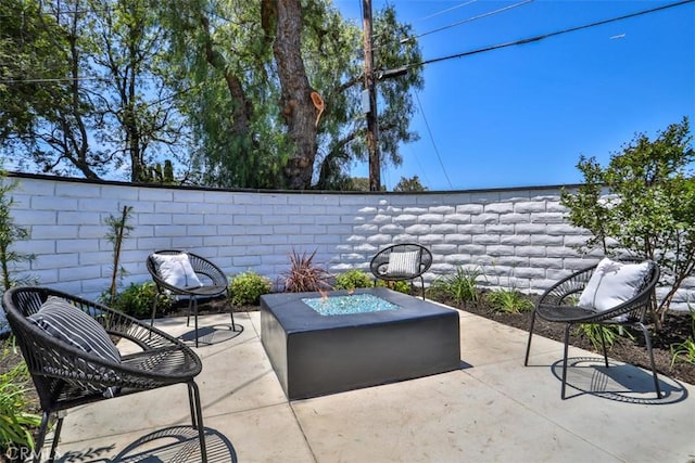 13181 Olympia Way N, Tustin, CA 92705 - view of patio / terrace with an outdoor fire pit