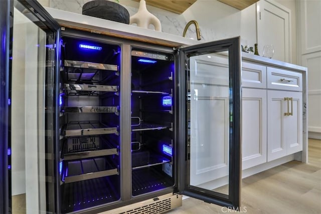 13181 Olympia Way N, Tustin, CA 92705 - wine room featuring wood finished floors