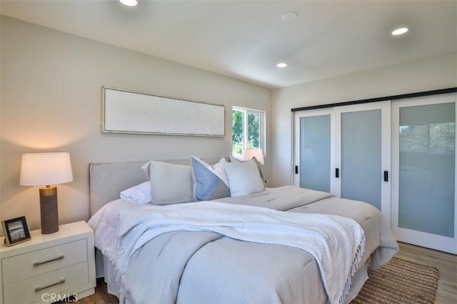 13181 Olympia Way N, Tustin, CA 92705 - bedroom with recessed lighting, wood finished floors, and a closet
