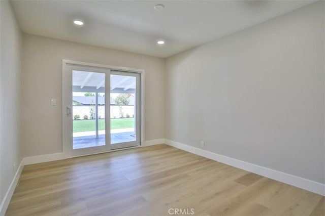 13181 Olympia Way N, Tustin, CA 92705 - empty room featuring light wood finished floors, baseboards, and recessed lighting
