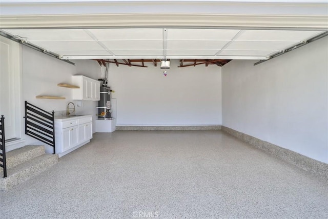 13181 Olympia Way N, Tustin, CA 92705 - garage with water heater, baseboards, and a sink