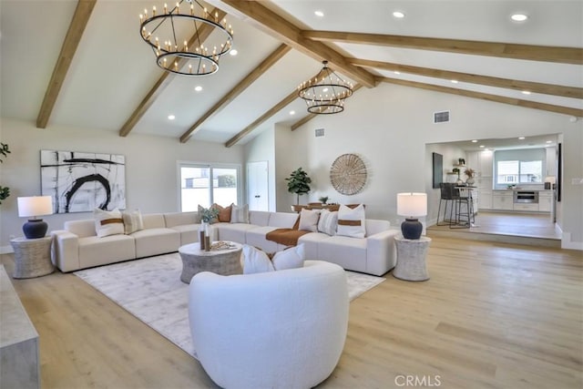 13181 Olympia Way N, Tustin, CA 92705 - living area with a chandelier, wood finished floors, recessed lighting, beamed ceiling, and high vaulted ceiling