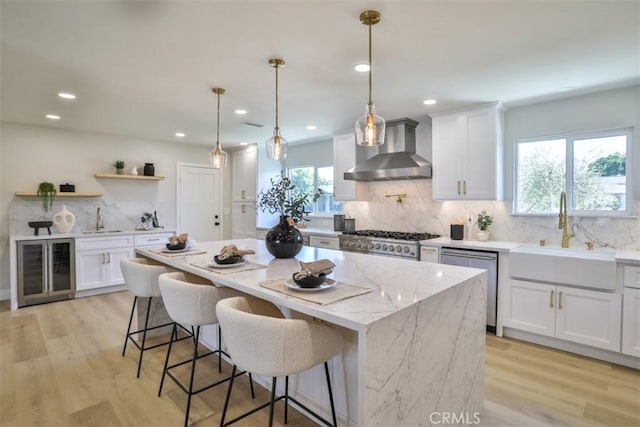 13181 Olympia Way N, Tustin, CA 92705 - kitchen with wall chimney exhaust hood, a sink, dishwasher, beverage cooler, and tasteful backsplash