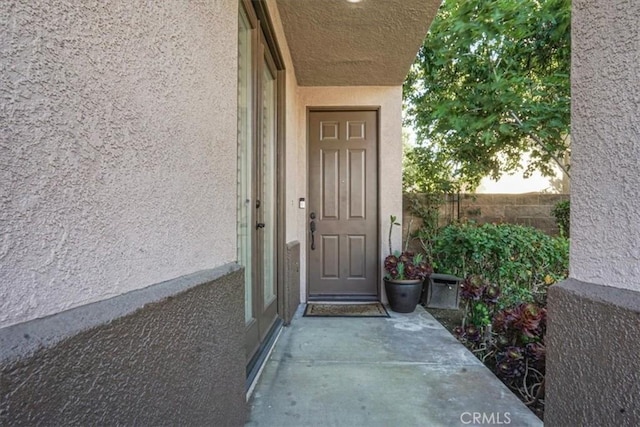 5794 Bay Hill Ln, Fontana, CA 92336 - property entrance with stucco siding