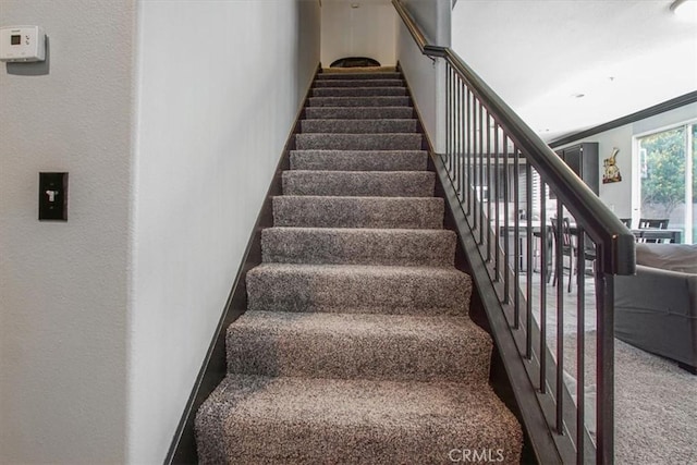 5794 Bay Hill Ln, Fontana, CA 92336 - stairway featuring carpet