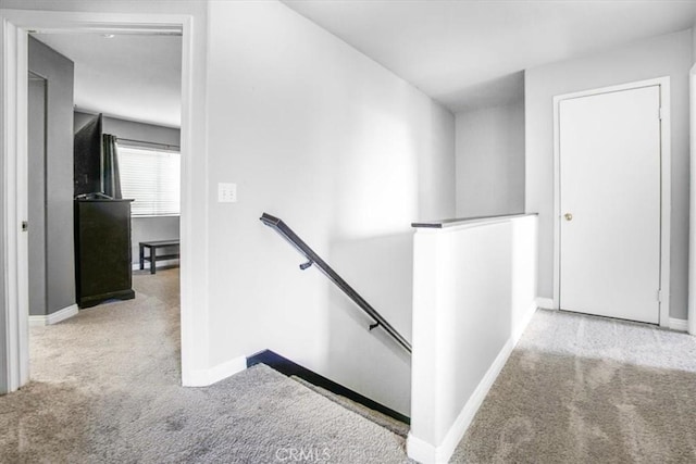 5794 Bay Hill Ln, Fontana, CA 92336 - hallway with an upstairs landing and carpet flooring