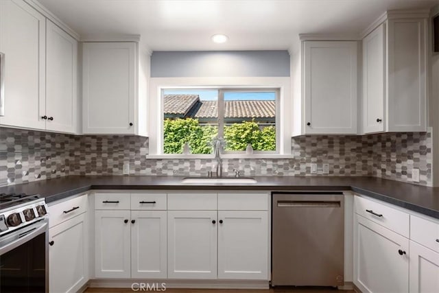 280 Tally Ho Rd, Arroyo Grande, CA 93420 - kitchen featuring stainless steel appliances, a sink, dark countertops, tasteful backsplash, and recessed lighting