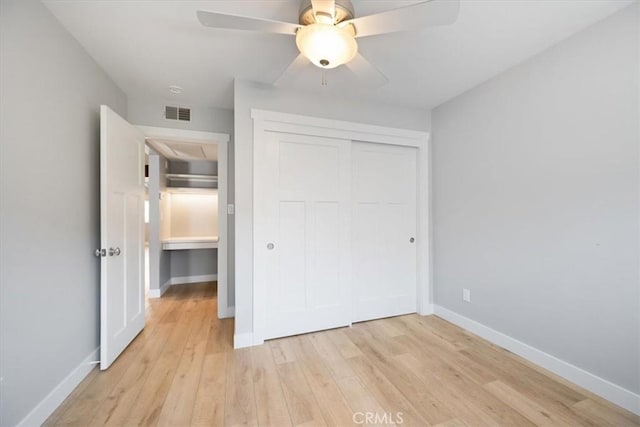 280 Tally Ho Rd, Arroyo Grande, CA 93420 - unfurnished bedroom with baseboards, light wood finished floors, a closet, and a ceiling fan