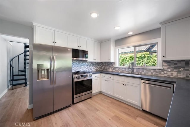 280 Tally Ho Rd, Arroyo Grande, CA 93420 - kitchen with appliances with stainless steel finishes, a sink, dark countertops, recessed lighting, and tasteful backsplash