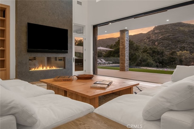 2775 Calbourne Ln, Westlake Village, CA 91361 - living area with a glass covered fireplace and built in features