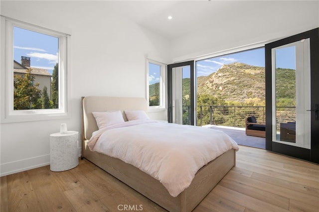 2775 Calbourne Ln, Westlake Village, CA 91361 - bedroom with access to exterior, light wood finished floors, recessed lighting, baseboards, and a mountain view