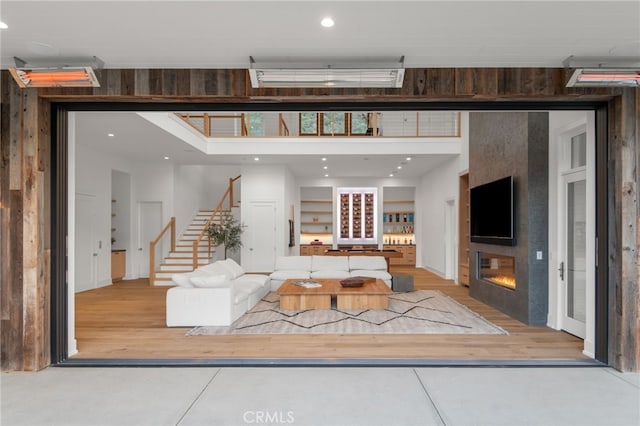 2775 Calbourne Ln, Westlake Village, CA 91361 - living area with stairway, wood finished floors, a large fireplace, and recessed lighting