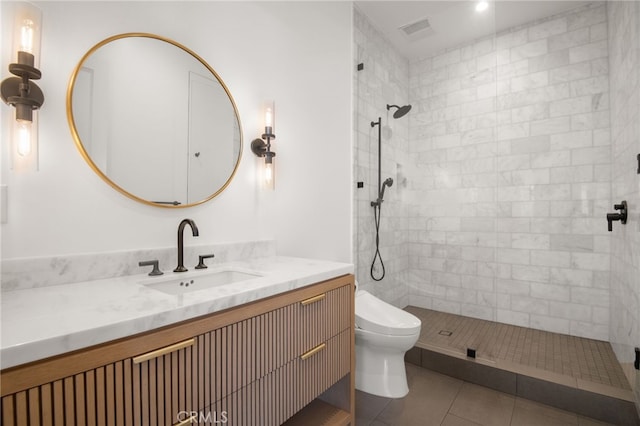2775 Calbourne Ln, Westlake Village, CA 91361 - bathroom featuring toilet, vanity, tiled shower, and tile patterned flooring
