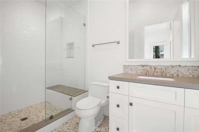 2775 Calbourne Ln, Westlake Village, CA 91361 - bathroom featuring toilet, vanity, a tile shower, backsplash, and tile patterned floors