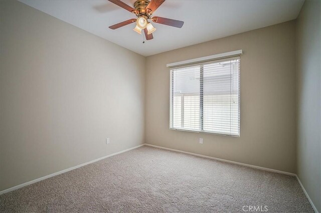 24347 Silver Bullet Way, Murrieta, CA 92562 - unfurnished room featuring carpet flooring, baseboards, and ceiling fan