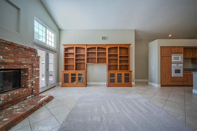 24347 Silver Bullet Way, Murrieta, CA 92562 - unfurnished living room featuring light tile patterned flooring, a brick fireplace, baseboards, and recessed lighting