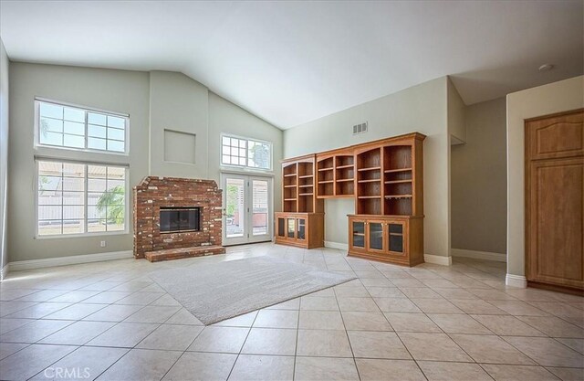 24347 Silver Bullet Way, Murrieta, CA 92562 - unfurnished living room featuring light tile patterned floors, baseboards, and high vaulted ceiling
