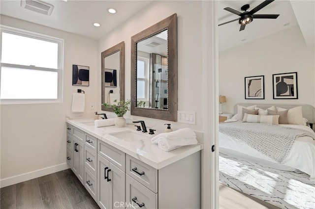 1802 Blossom Ln, Redondo Beach, CA 90278 - full bathroom with double vanity, wood finished floors, a ceiling fan, and recessed lighting