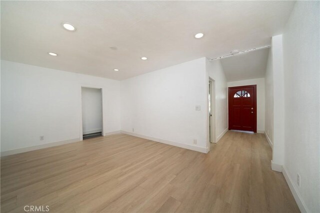 15251 Cedarwood Ave, Midway City, CA 92655 - empty room with recessed lighting, light wood-style floors, and baseboards