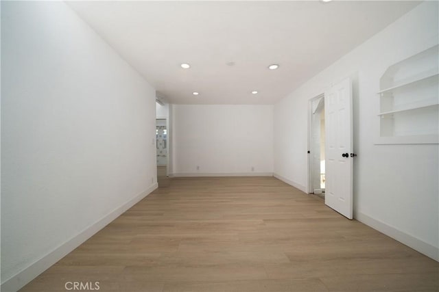 15251 Cedarwood Ave, Midway City, CA 92655 - unfurnished room featuring recessed lighting, light wood-style floors, and baseboards