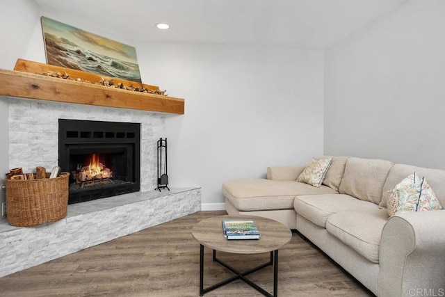 2345 Levante St, Carlsbad, CA 92009 - living room featuring a lit fireplace, wood finished floors, recessed lighting, and baseboards