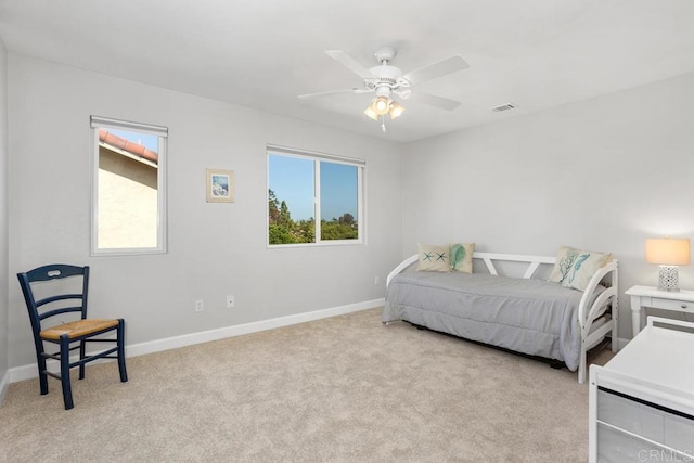 2345 Levante St, Carlsbad, CA 92009 - carpeted bedroom with baseboards and ceiling fan