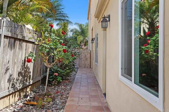 2345 Levante St, Carlsbad, CA 92009 - view of side of home featuring stucco siding